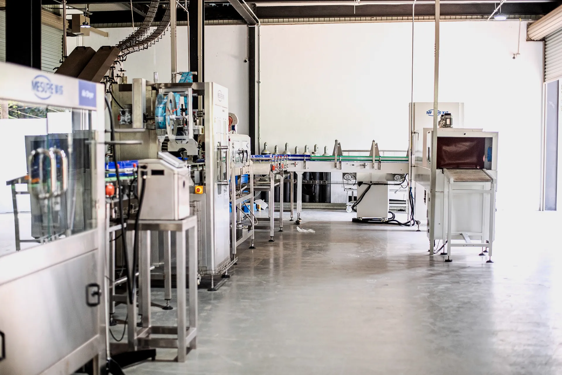 Samley beverage canning hall in Sri Lanka with the filling line running the length of the floor