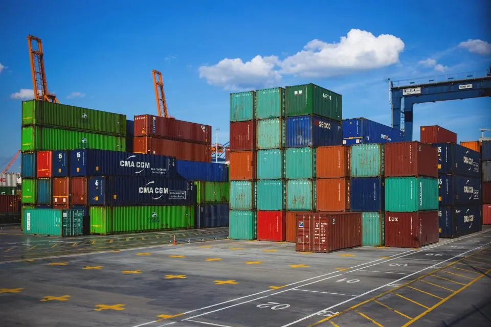 Shipping containers stacked at a cargo port