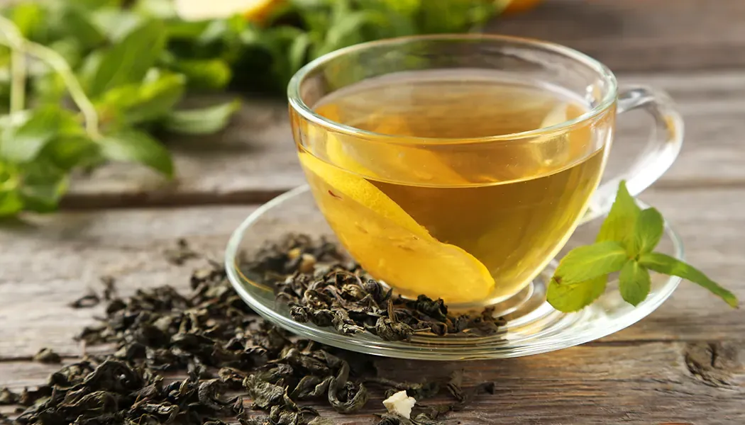 Ceylon green tea brewed in a glass cup